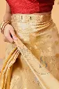 Ready-to-wear-saree-golden-closeup.webp